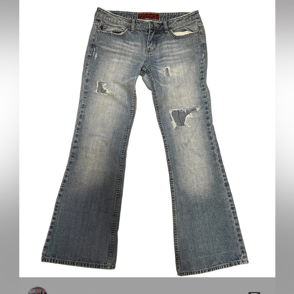 Vintage low rise flare light wash distressed denim jeans from brand YMI jeans